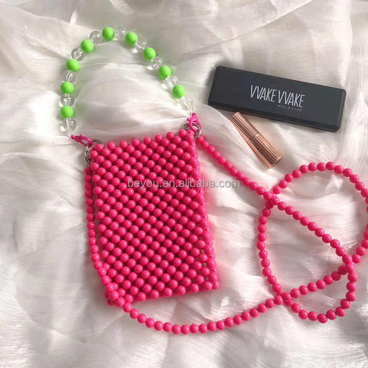 حقيبة يد نسائية جديدة باللون الوردي الفاقع والأخضر