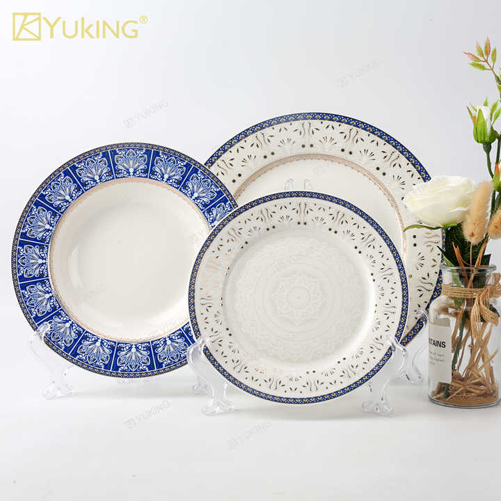 cups and saucers . الكؤوس والصحون