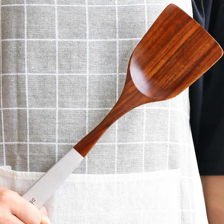 Multi-colored teak-coated kitchen tools