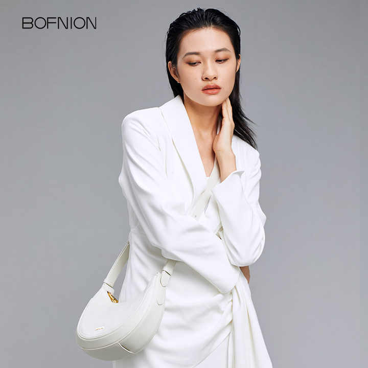 High quality crescent bag with designer design made of first layer cowhide