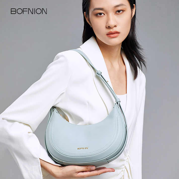 High quality crescent bag with designer design made of first layer cowhide