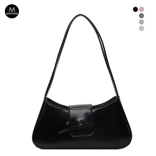 حقائب يد نسائية من الجلد الصناعي