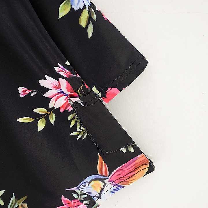 Elegant black dress with a fashion design, matching clothes for women and mothers