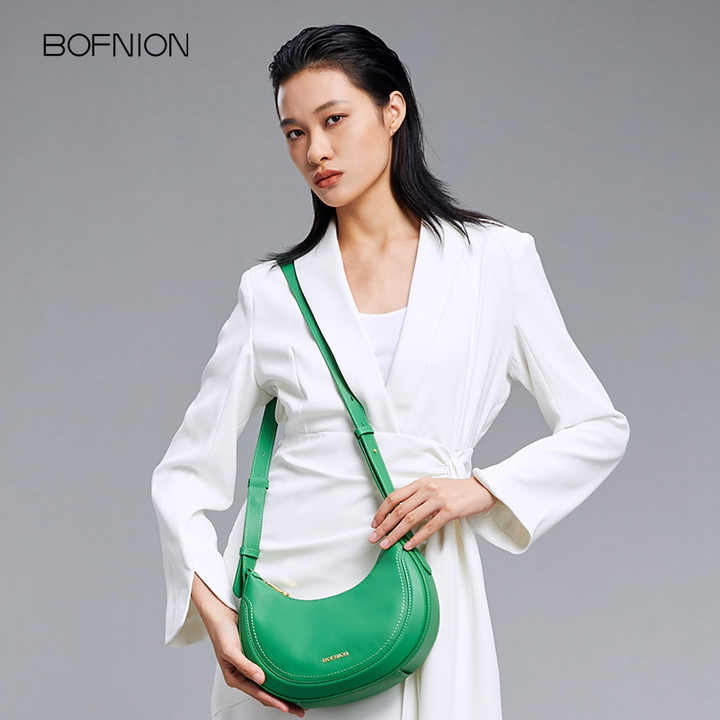 High quality crescent bag with designer design made of first layer cowhide