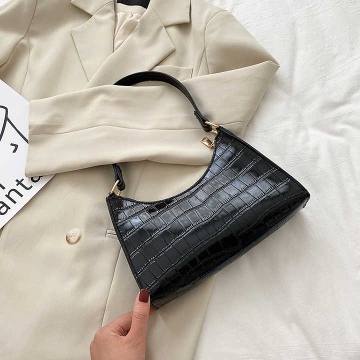 Fashionable women's crocodile leather handbag