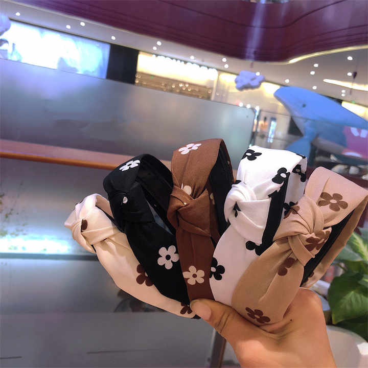 اطواق الشعر معقوده