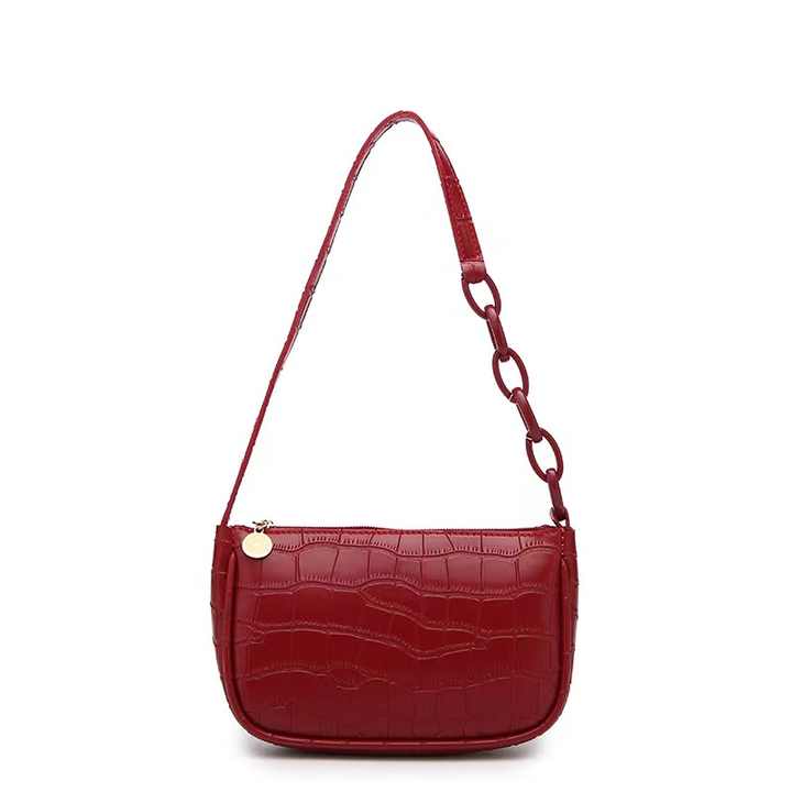 Elegant women's handbags made of PU leather with snakeskin print
