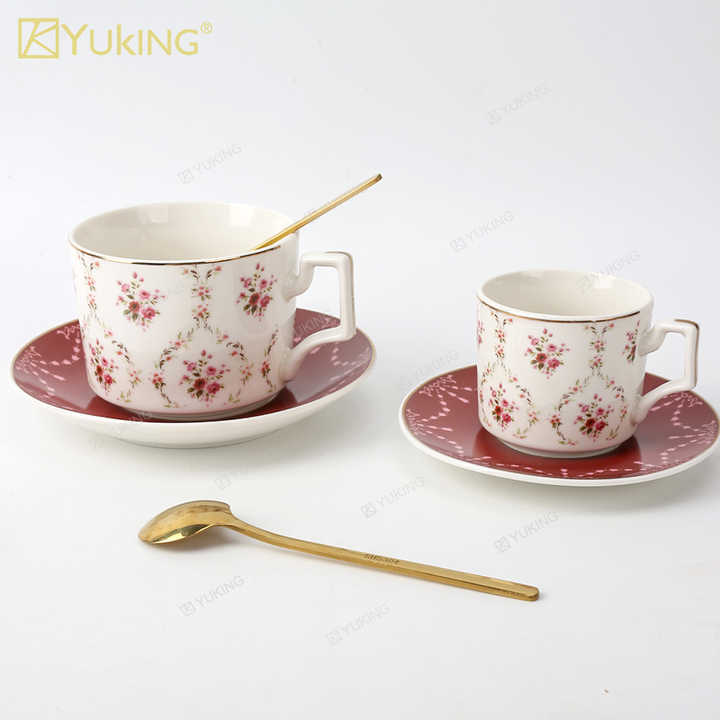 cups and saucers . الكؤوس والصحون