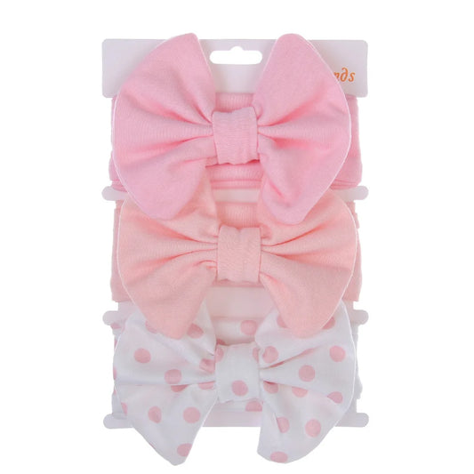 ثلاث قطع من مشابك الرأس