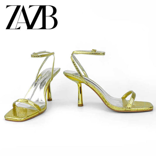 أحذية كعب عالٍ جلدية ذهبية فاخرة