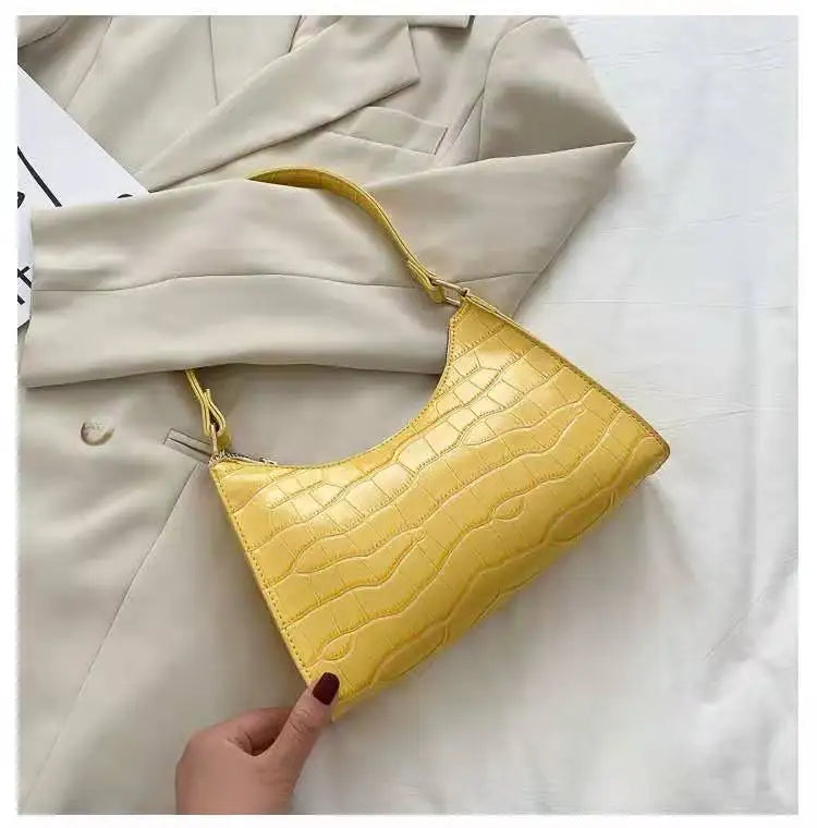 Fashionable women's crocodile leather handbag
