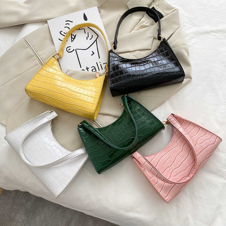 Fashionable women's crocodile leather handbag