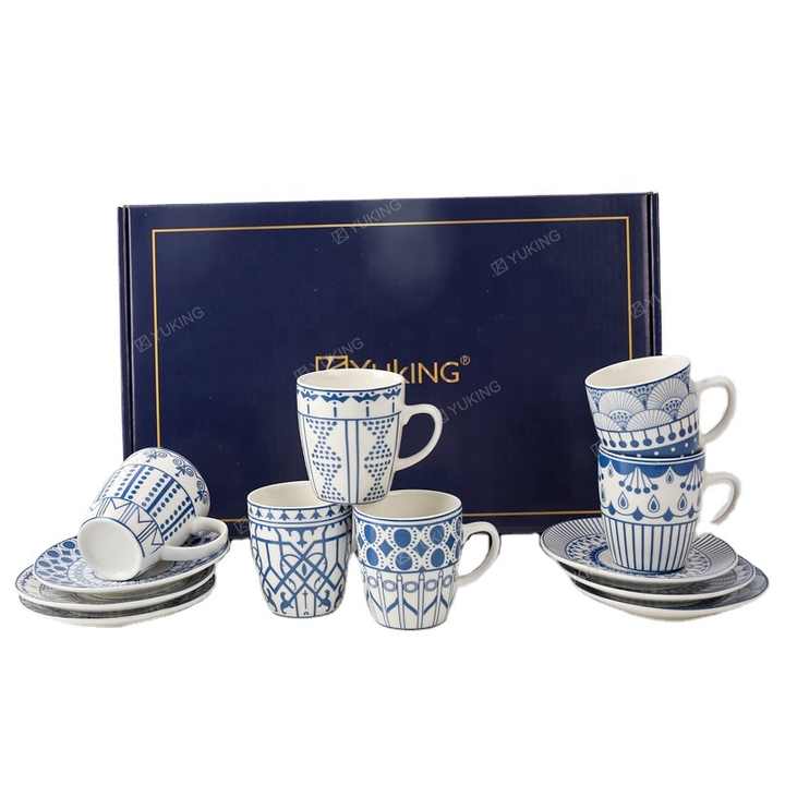 cups and saucers . الكؤوس والصحون