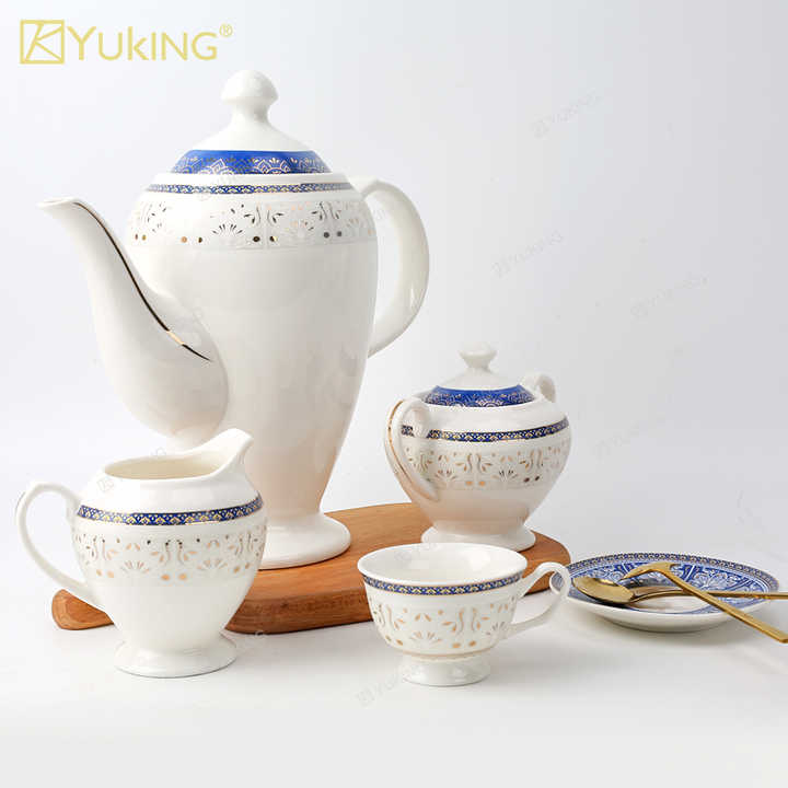 cups and saucers . الكؤوس والصحون