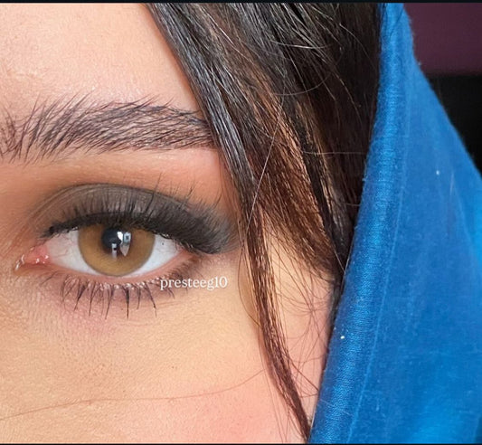 meem lenses- عدسة براون