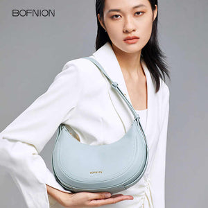 High quality crescent bag with designer design made of first layer cowhide 
