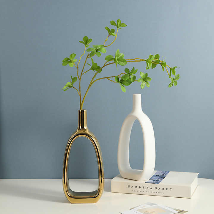 Nordic ceramic vase for home decoration ornaments golden silver white ceramic art vases. 