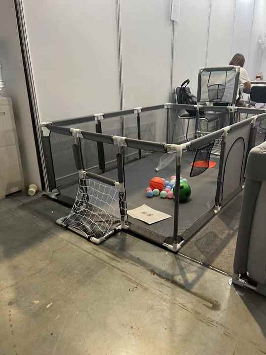 Large playpen with door and basket Playpen with special feature 