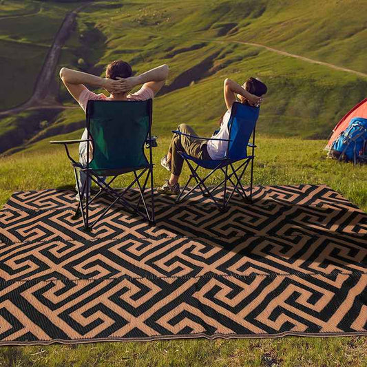 Plastic straw mat for outdoor activities. 