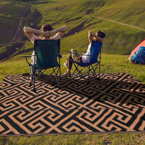 Plastic straw mat for outdoor activities. 