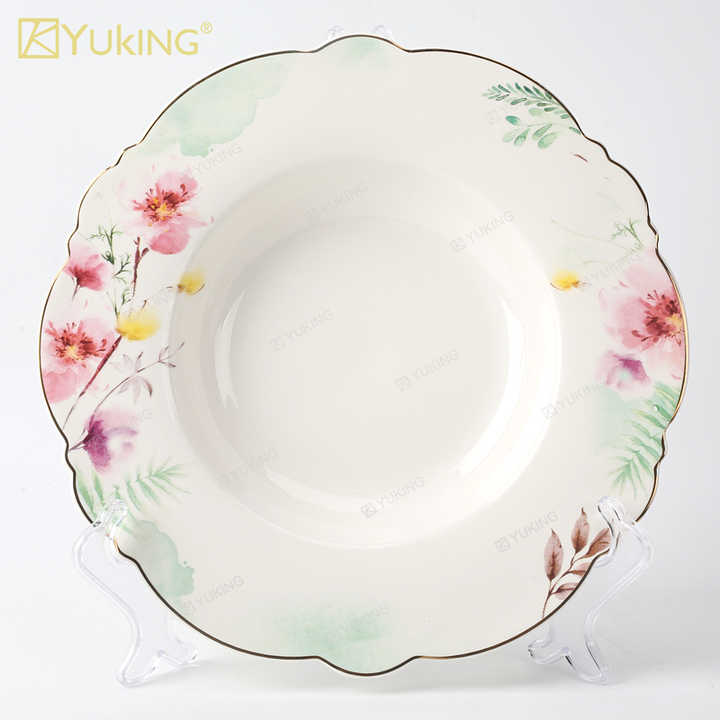 cups and saucers . الكؤوس والصحون