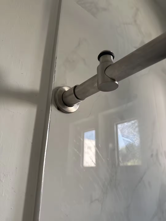 Frameless shower cabin with sliding door