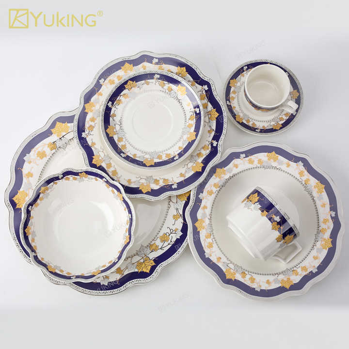 cups and saucers . الكؤوس والصحون