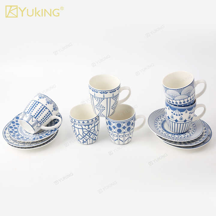 cups and saucers . الكؤوس والصحون