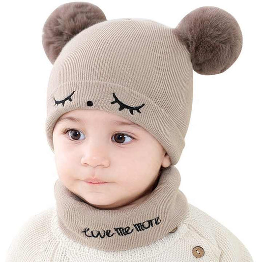 Small baby hats embroidered with eyes 