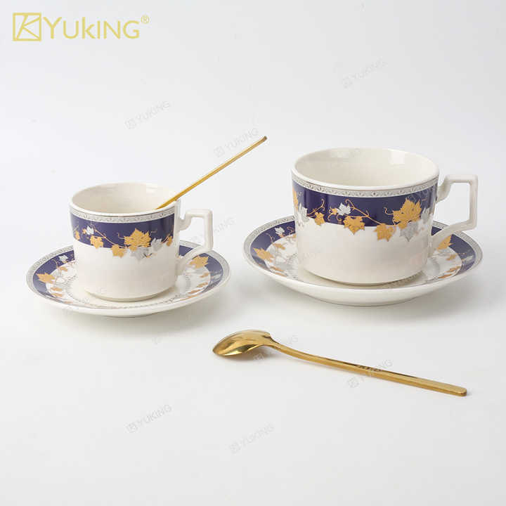 cups and saucers . الكؤوس والصحون