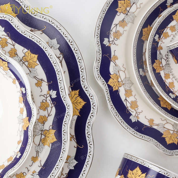 cups and saucers . الكؤوس والصحون