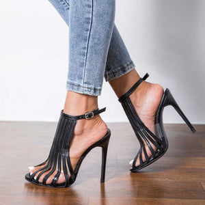 Luxury women's sandals designed with a custom metal buckle and 