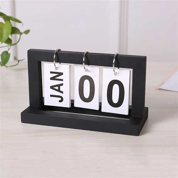 wooden calendar تقويم خشبي