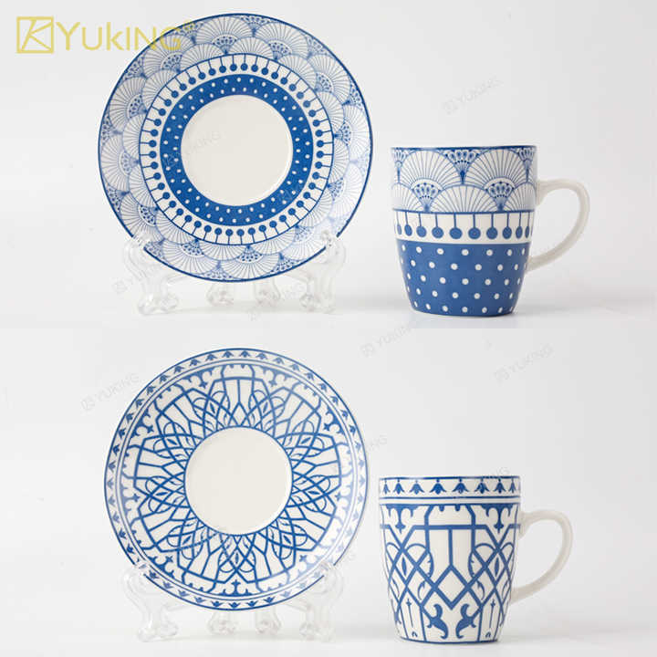 cups and saucers . الكؤوس والصحون