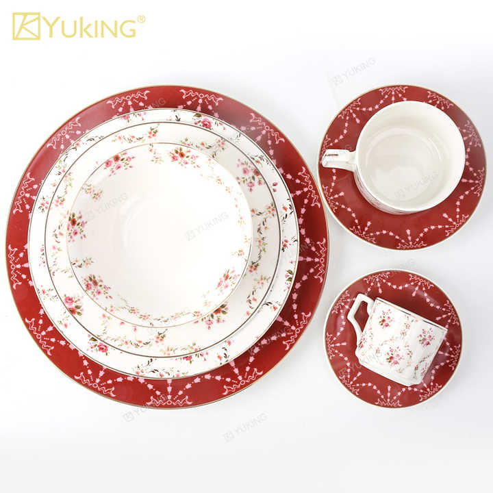 cups and saucers . الكؤوس والصحون