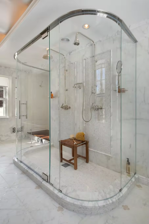 Frameless shower cabin with sliding door