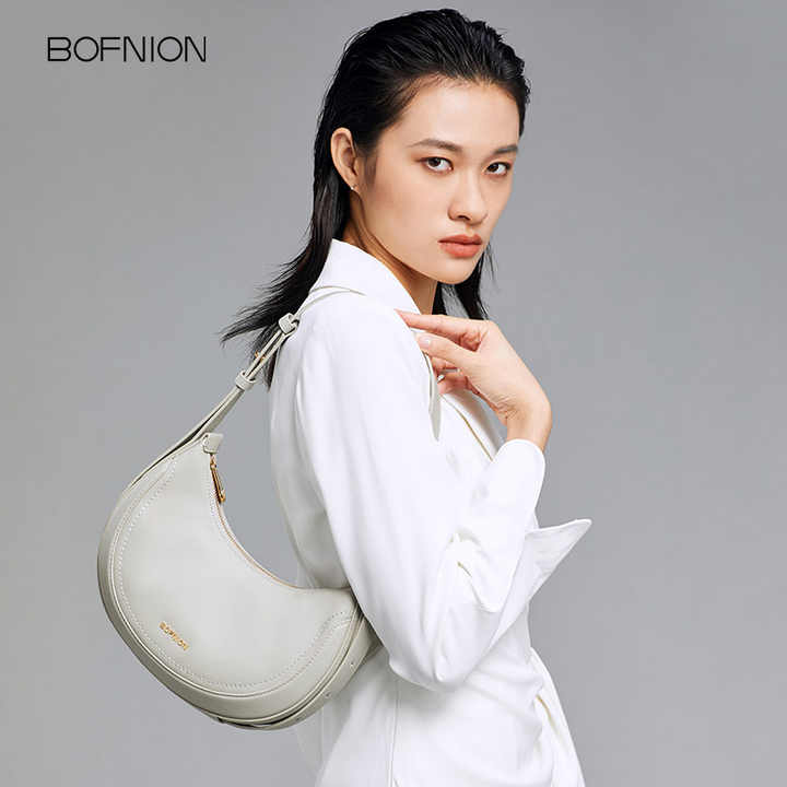 High quality crescent bag with designer design made of first layer cowhide 
