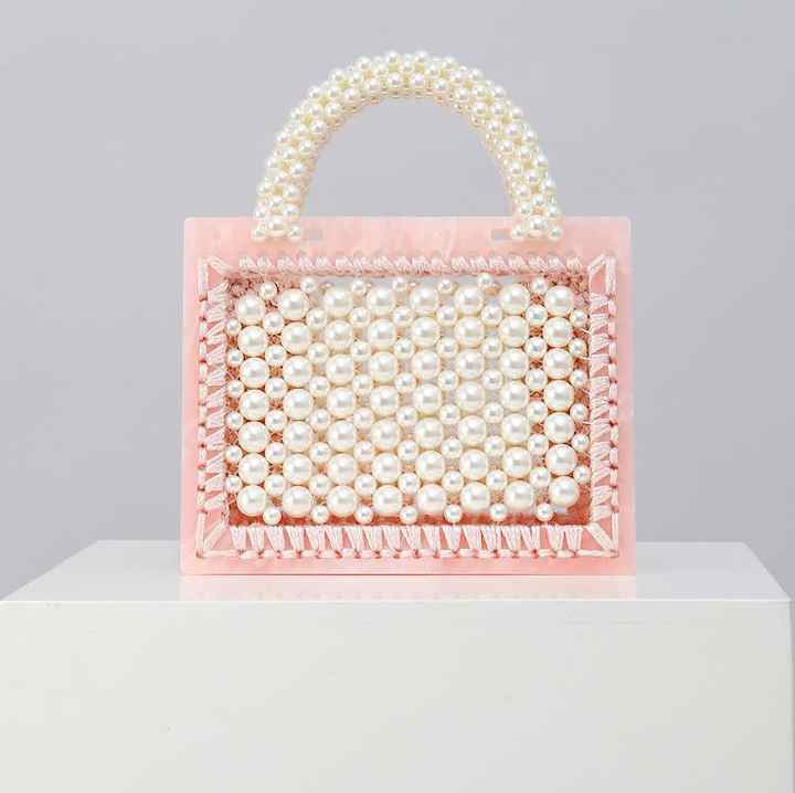 Luxury Pearl Handbag with Transparent Design