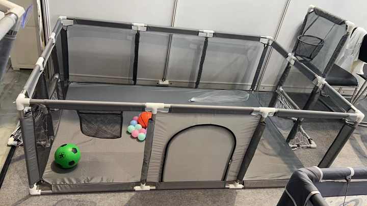 Large playpen with door and basket Playpen with special feature 