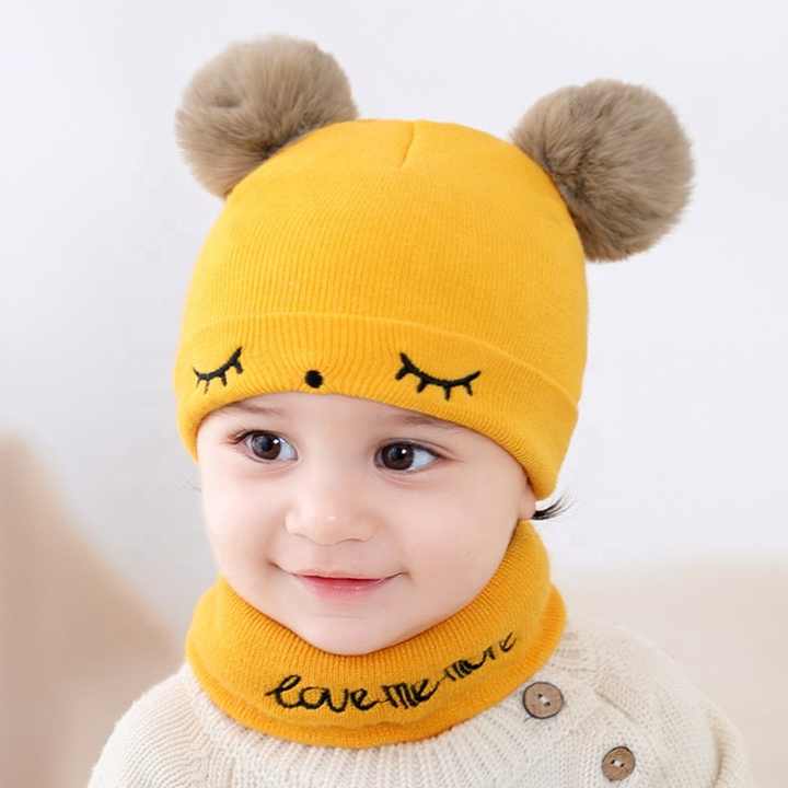 Small baby hats embroidered with eyes 