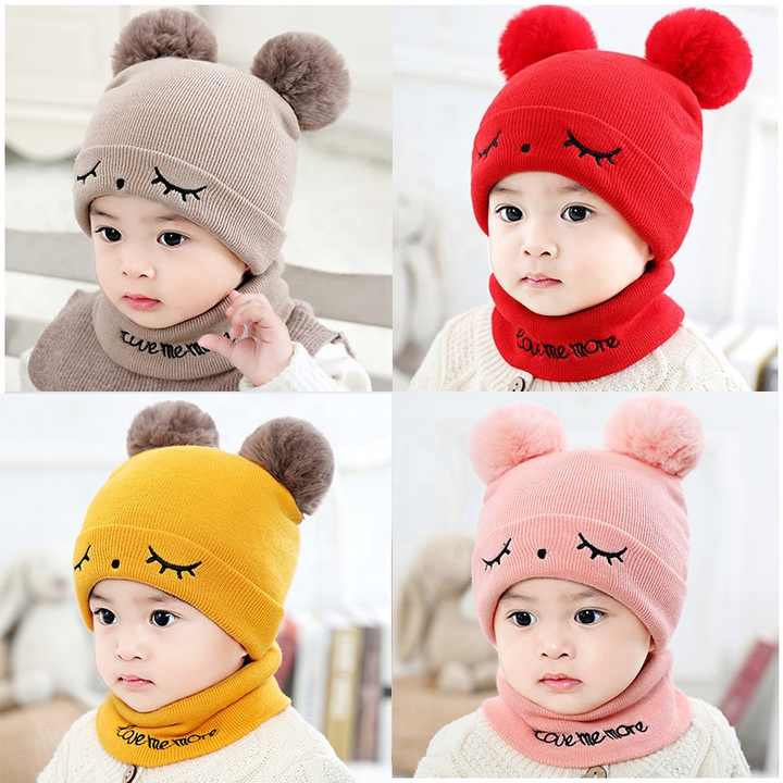 Small baby hats embroidered with eyes 
