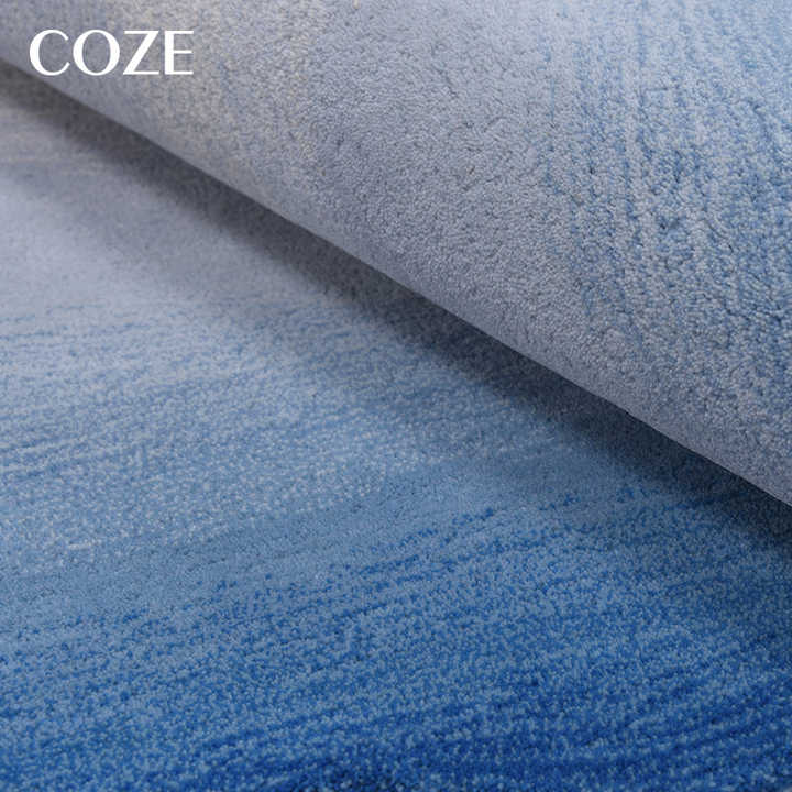 Irregular and uniquely shaped wool rug made especially for the living room, in the French style of Wabi-Sabi. 