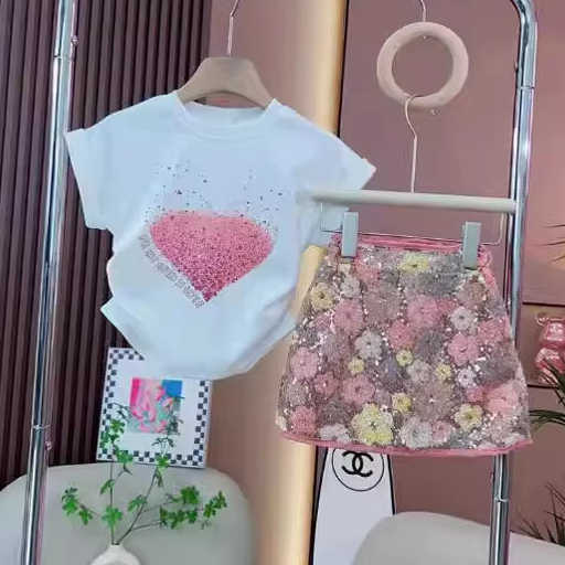 بدلة صيفية عصرية للبنات من قطعتين تي شيرت بأكمام قصيرة وتنورة Girls' Fashion Summer 2-Piece Suit Short Sleeve T-Shirt