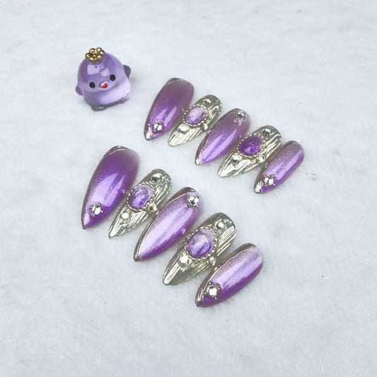 Handmade almond-shaped nails in purple 