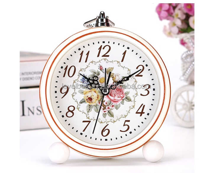 antique analog alarm clock 