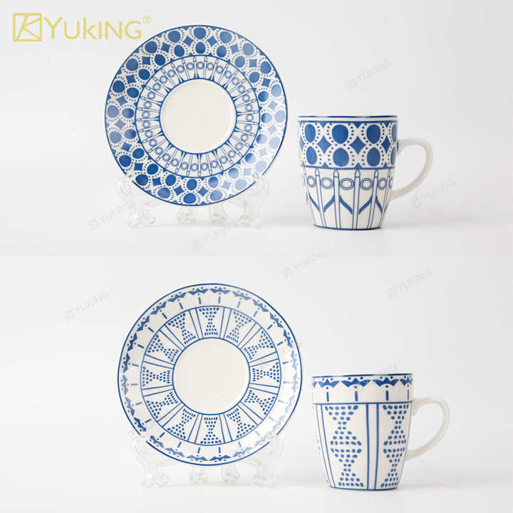cups and saucers . الكؤوس والصحون