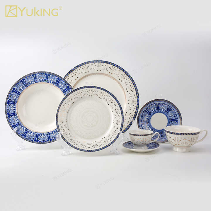 cups and saucers . الكؤوس والصحون