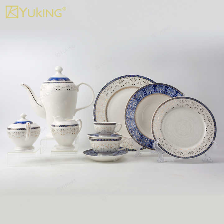 cups and saucers . الكؤوس والصحون