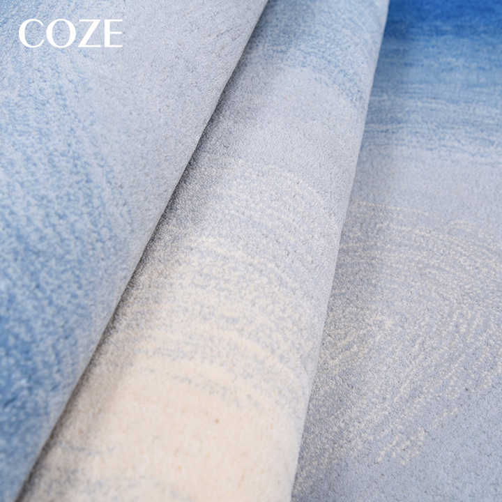 Irregular and uniquely shaped wool rug made especially for the living room, in the French style of Wabi-Sabi. 