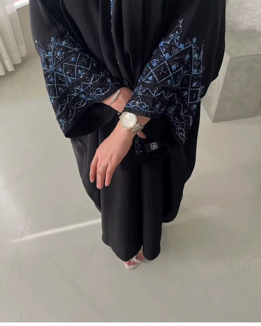 : عبايات abaya